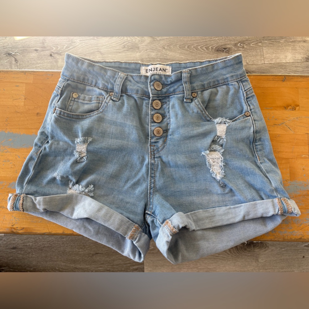 Woman’s Light Blue Distressed High-Waist Denim Enjean Denim Co. Shorts